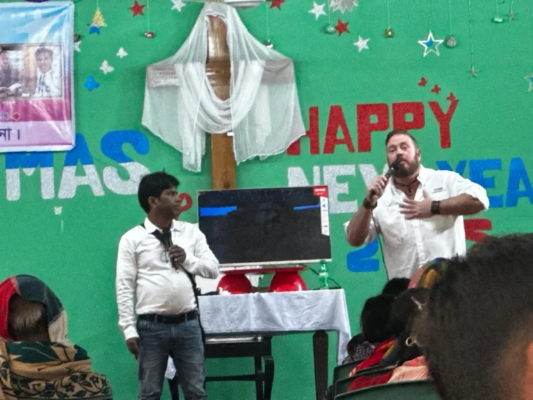 Missionary team sharing the Gospel in a village Gospel outreach event with local community Discipleship training program for new believers Volunteers praying for mission work abroad Children participating in Bible study on mission trip Outdoor Jesus Film screening for villagers Team providing meals and support during outreach Local church packed for Gospel presentation Missionaries teaching faith to new believers Supporters giving generously to Christian missions Prayer meeting for global mission trips Team walking through village during outreach Sharing the Gospel with Hindu villagers in a temple Community gathering for evangelism event Missionary teaching Scripture during small group Donors helping fund international mission programs Team preparing materials for Gospel outreach Local children learning about Jesus during mission Volunteers praying over new believers Mission trip team serving the community with love